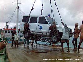 Ambulance lifted by the crane