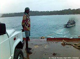 The pantoon  towed by small boat